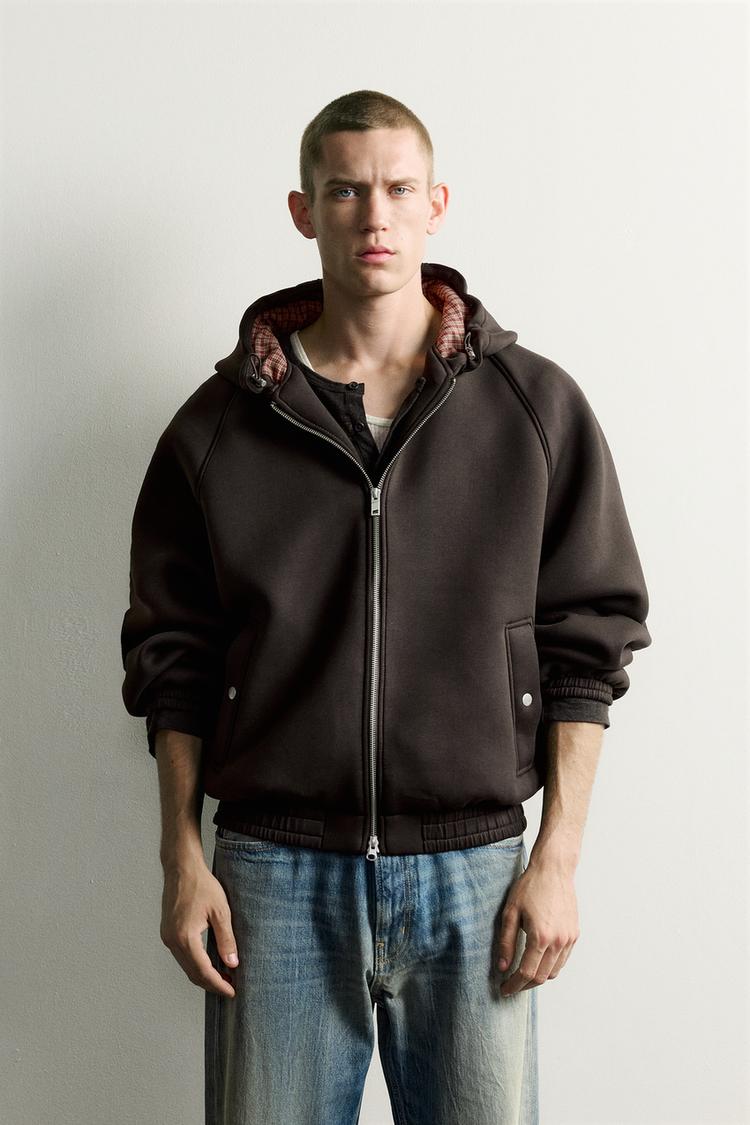 CHAQUETA TÉCNICA RELAXED FIT CAPUCHA