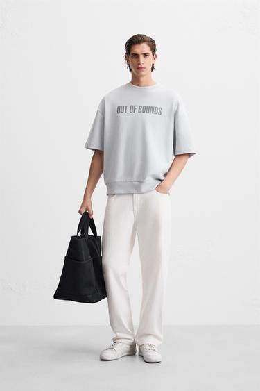 SUDADERA LAVADA TEXTOS - Azul claro de Zara - Imagen 0