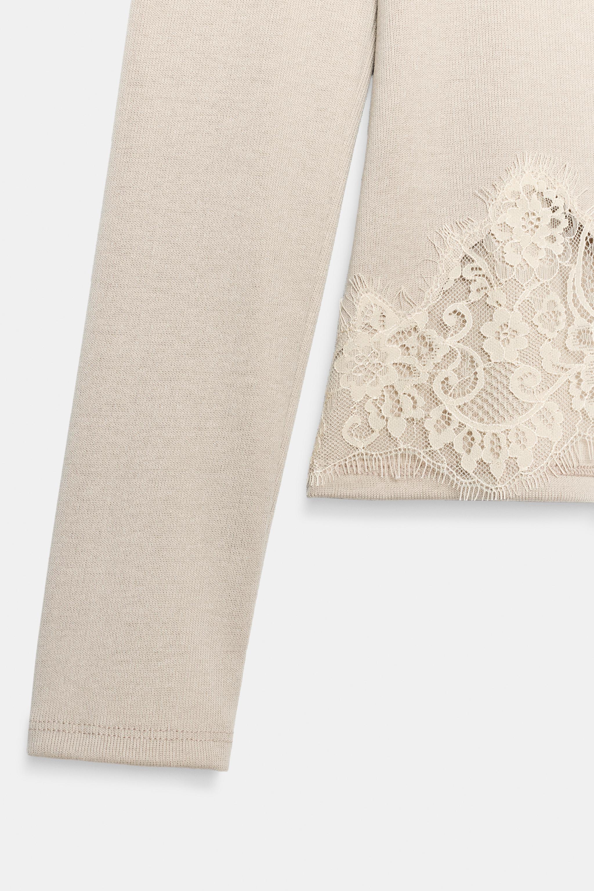 ASYMMETRIC LACE TOP