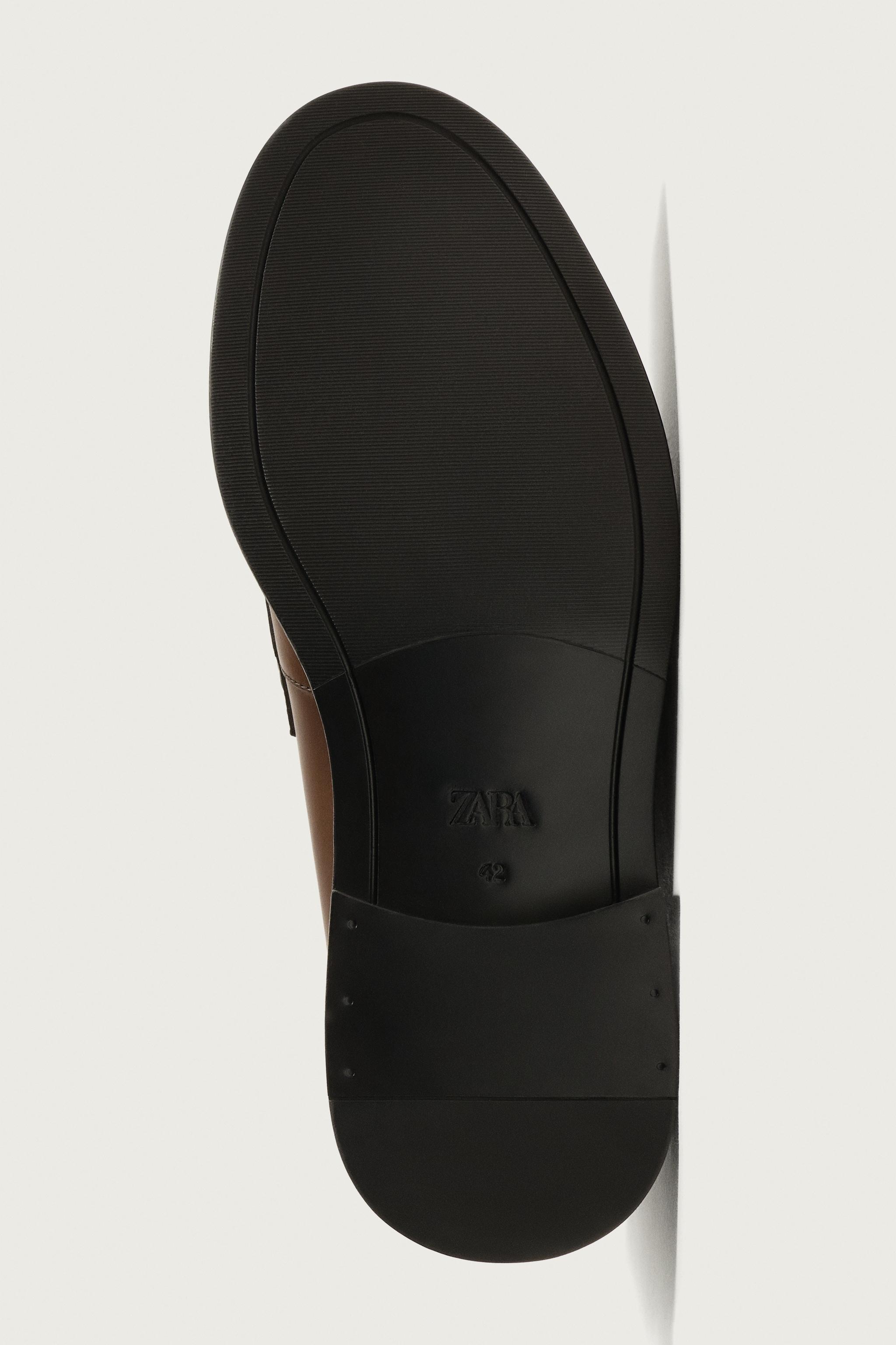 MOCASSINS EN CUIR AVEC MASQUE