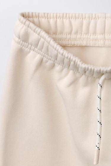 PANTALON EN MOLLETON À JAMBES LARGES - Écru de Zara - Image 2