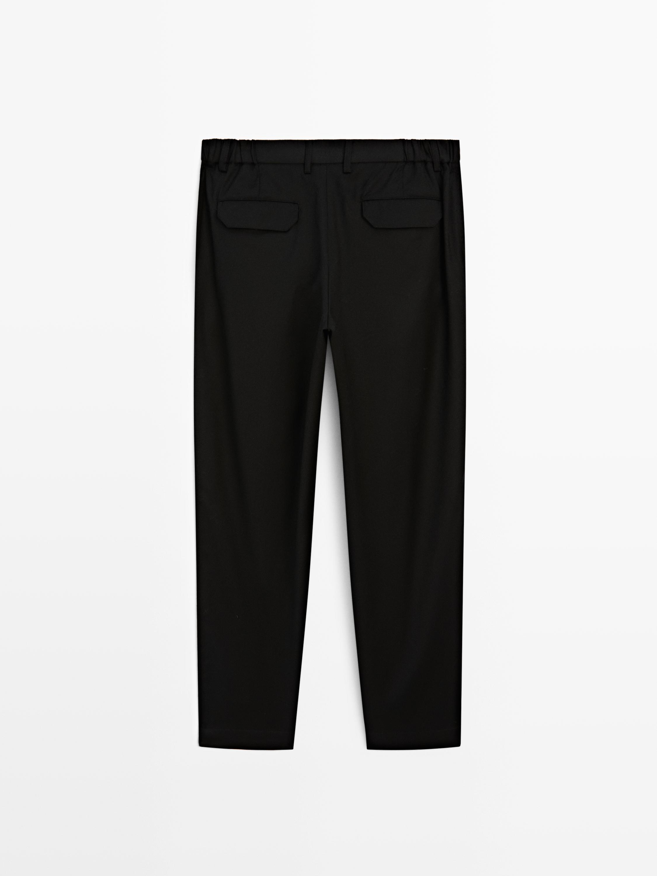 Relaxed fit wool blend darted trousers