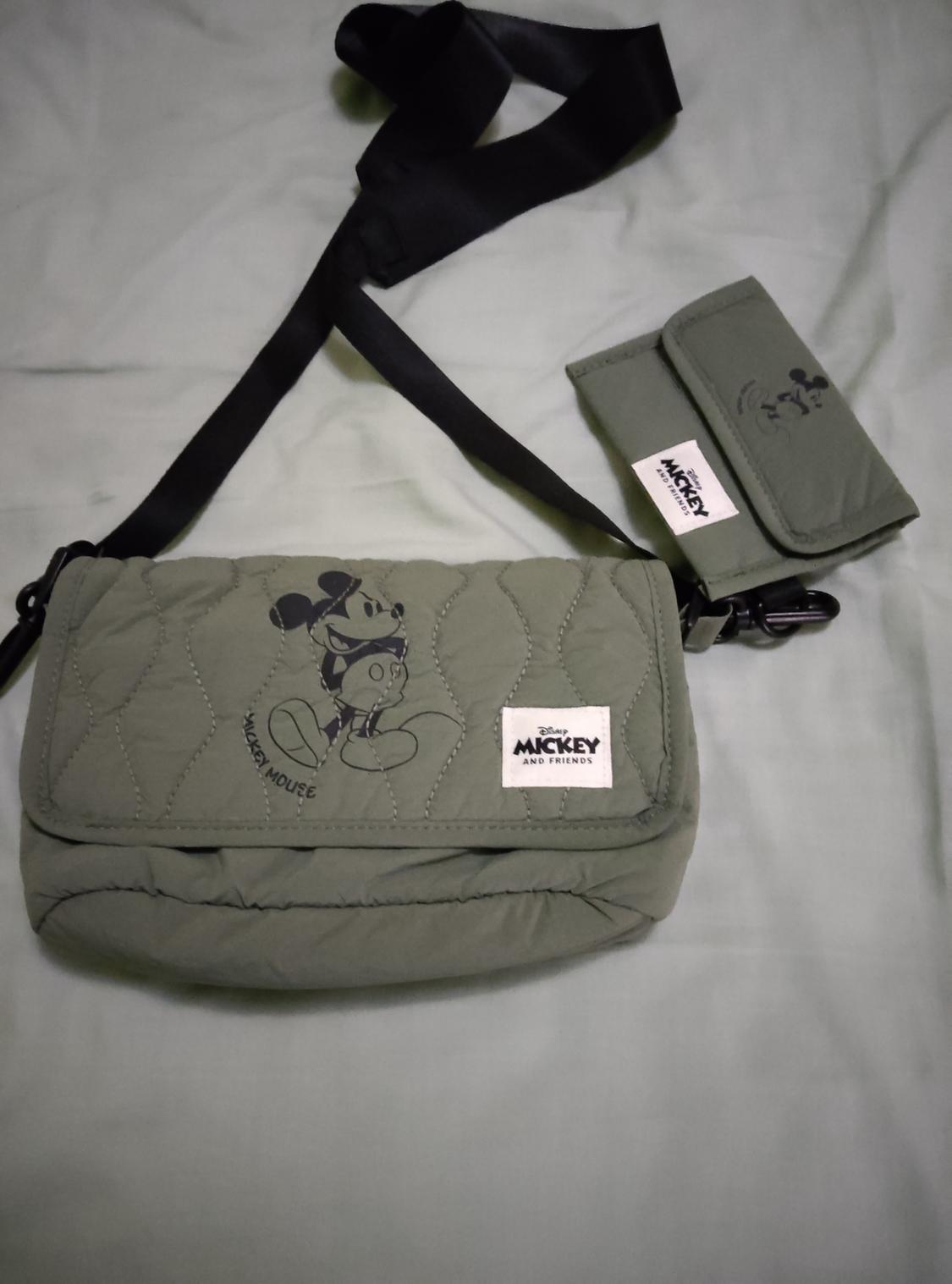 Quilted green bag with Mickey Mouse design and "Disney Mickey and Friends" tag. Includes a small matching purse.