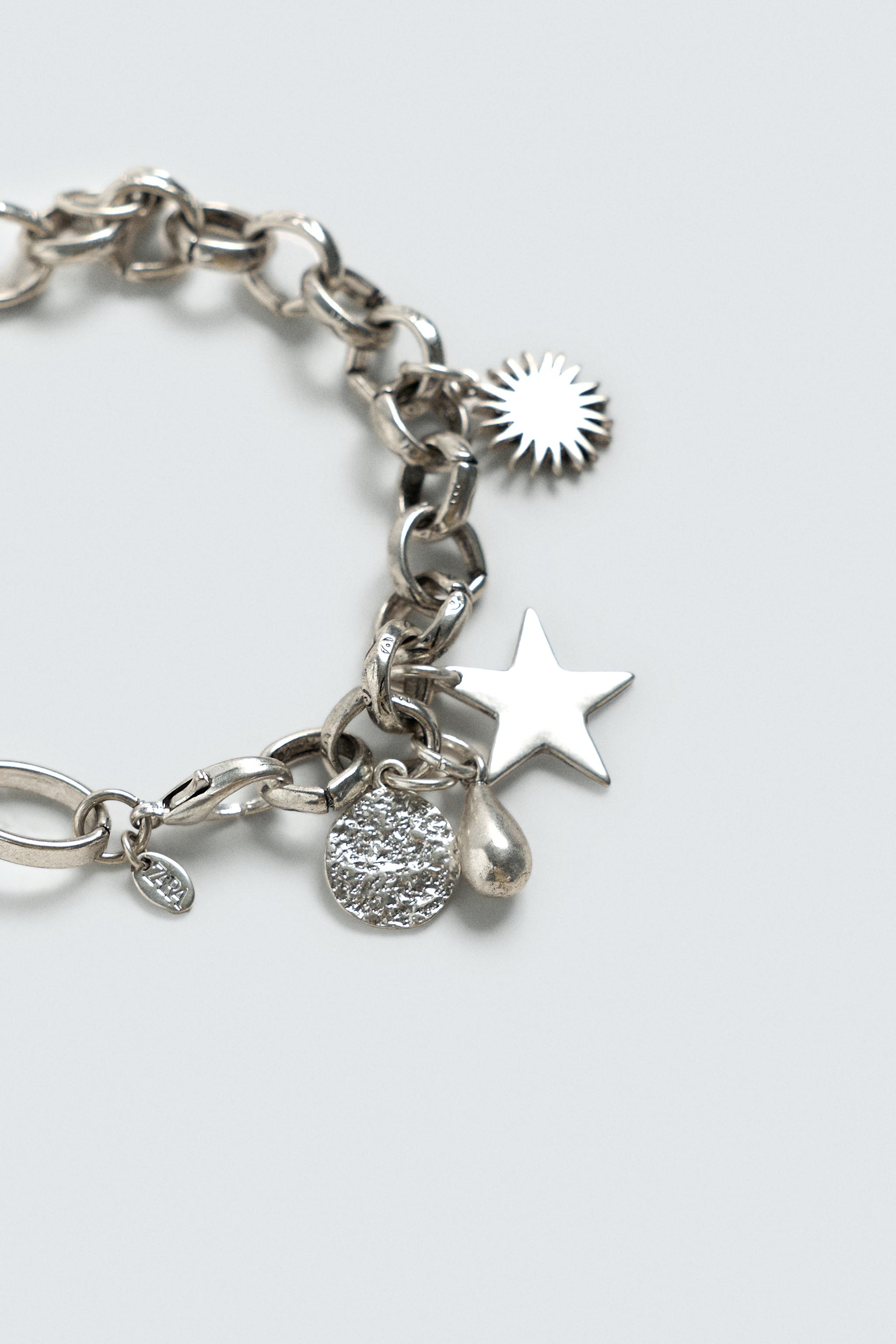 BRACELET MÉTALLIQUE CHARMS