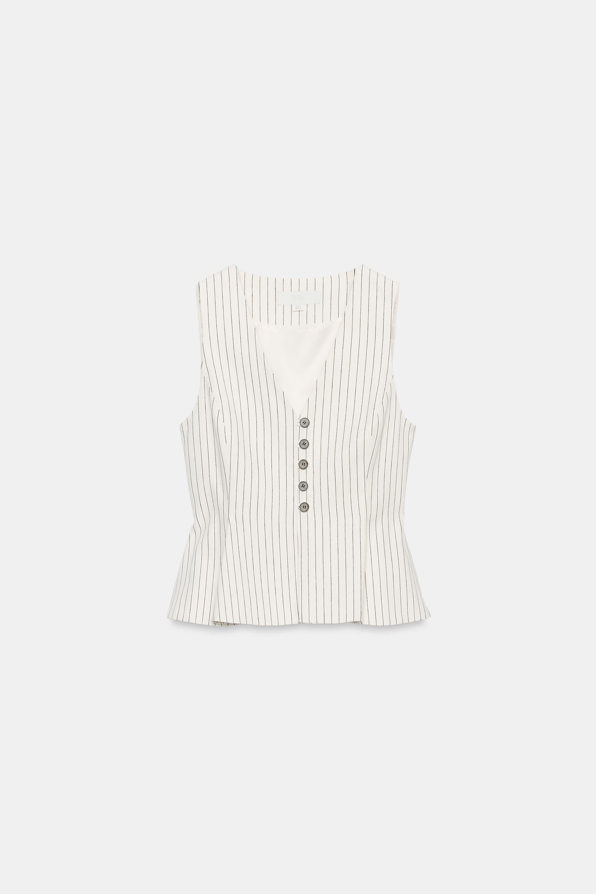 STRIPED PEPLUM VEST