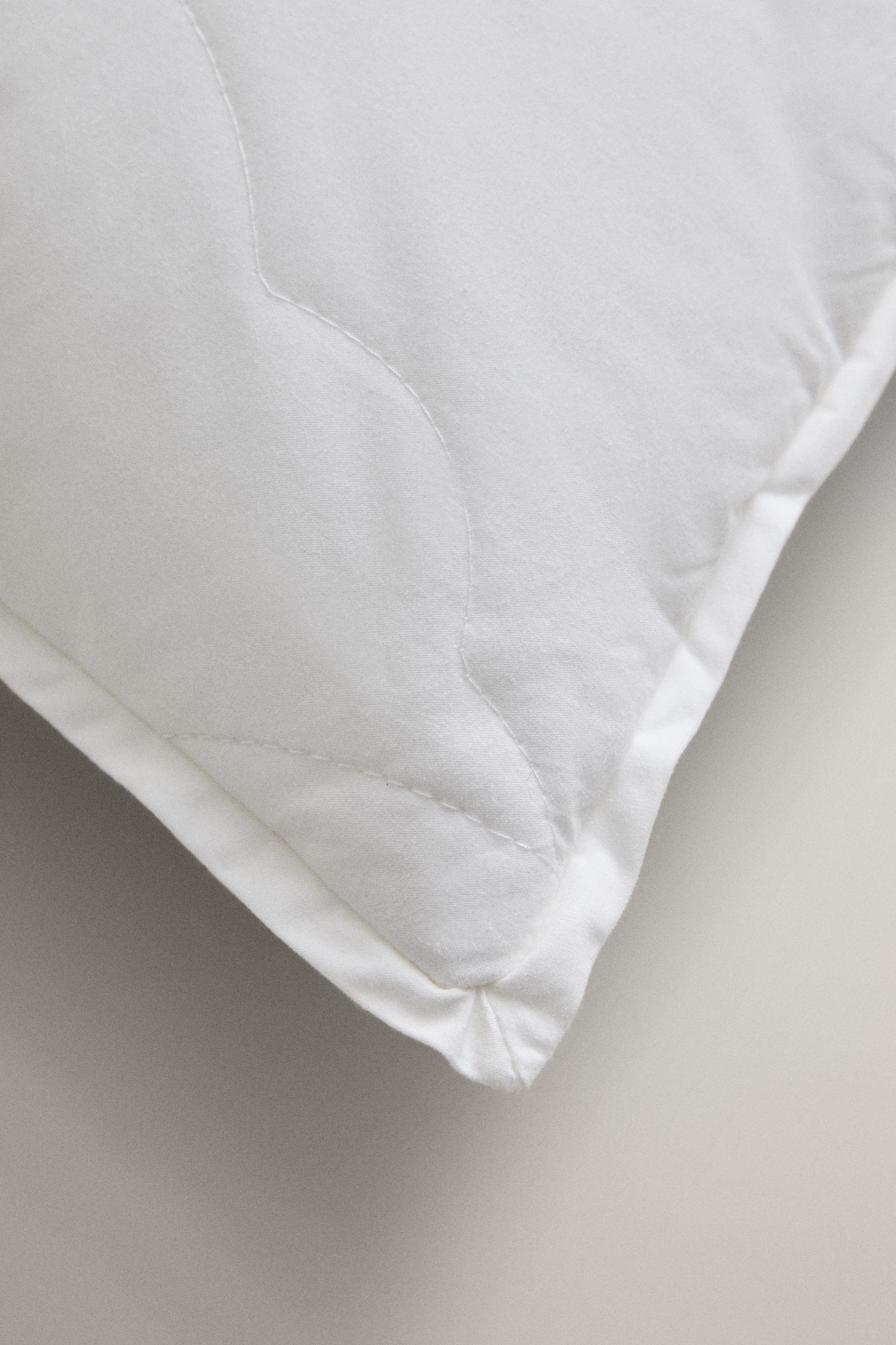 KIDS’ SOFT-TOUCH QUILTED FIBER PILLOW