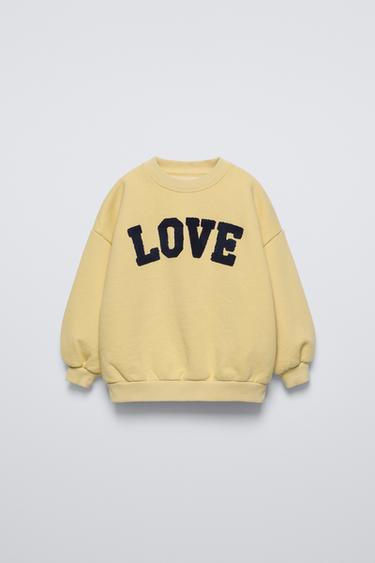SUDADERA PARCHE RIZO - Amarillo pastel de Zara