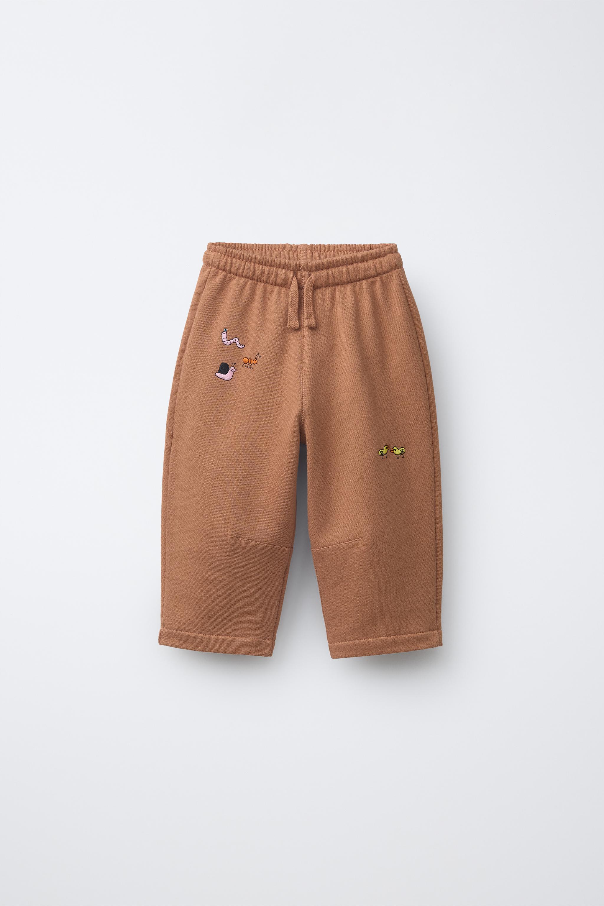 EMBROIDERED ANIMAL PLUSH PANTS