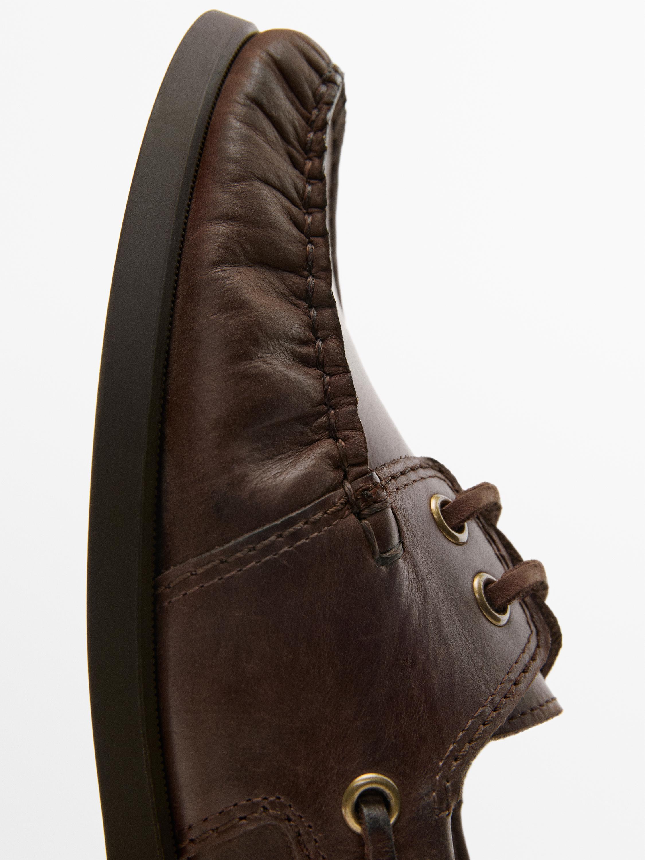 Oiled leather deck shoes