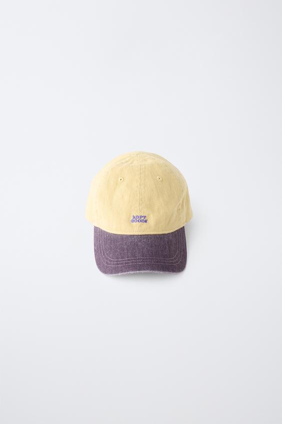 GORRA EFECTO LAVADO TEXTO BORDADO - Mostaza de Zara - Imagen 0