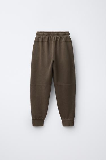 PANTALON SLIM À ZIPS - Marron clair de Zara - Image 1