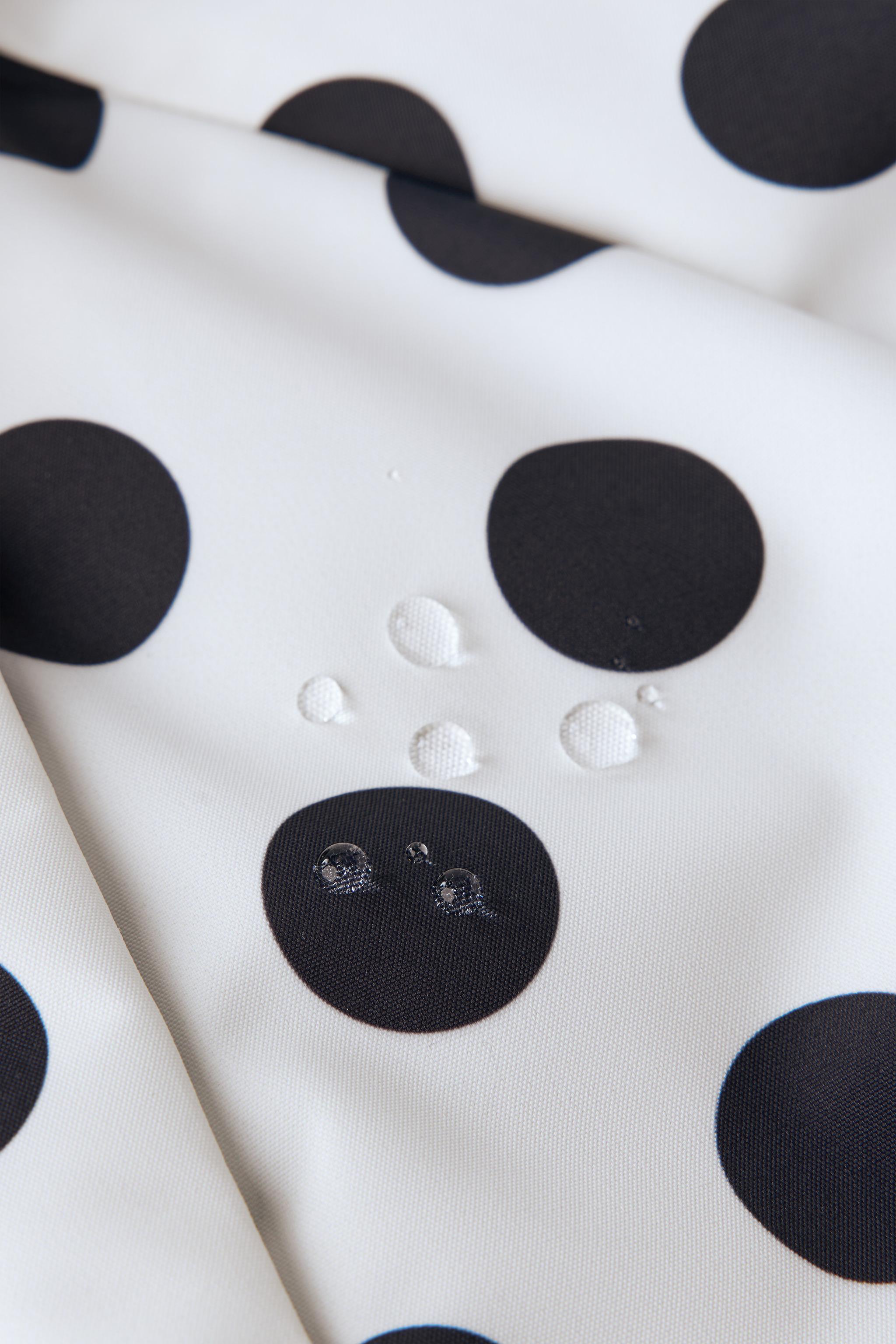 WATER RESISTANT AND WINDPROOF POLKA DOT JUMPSUIT