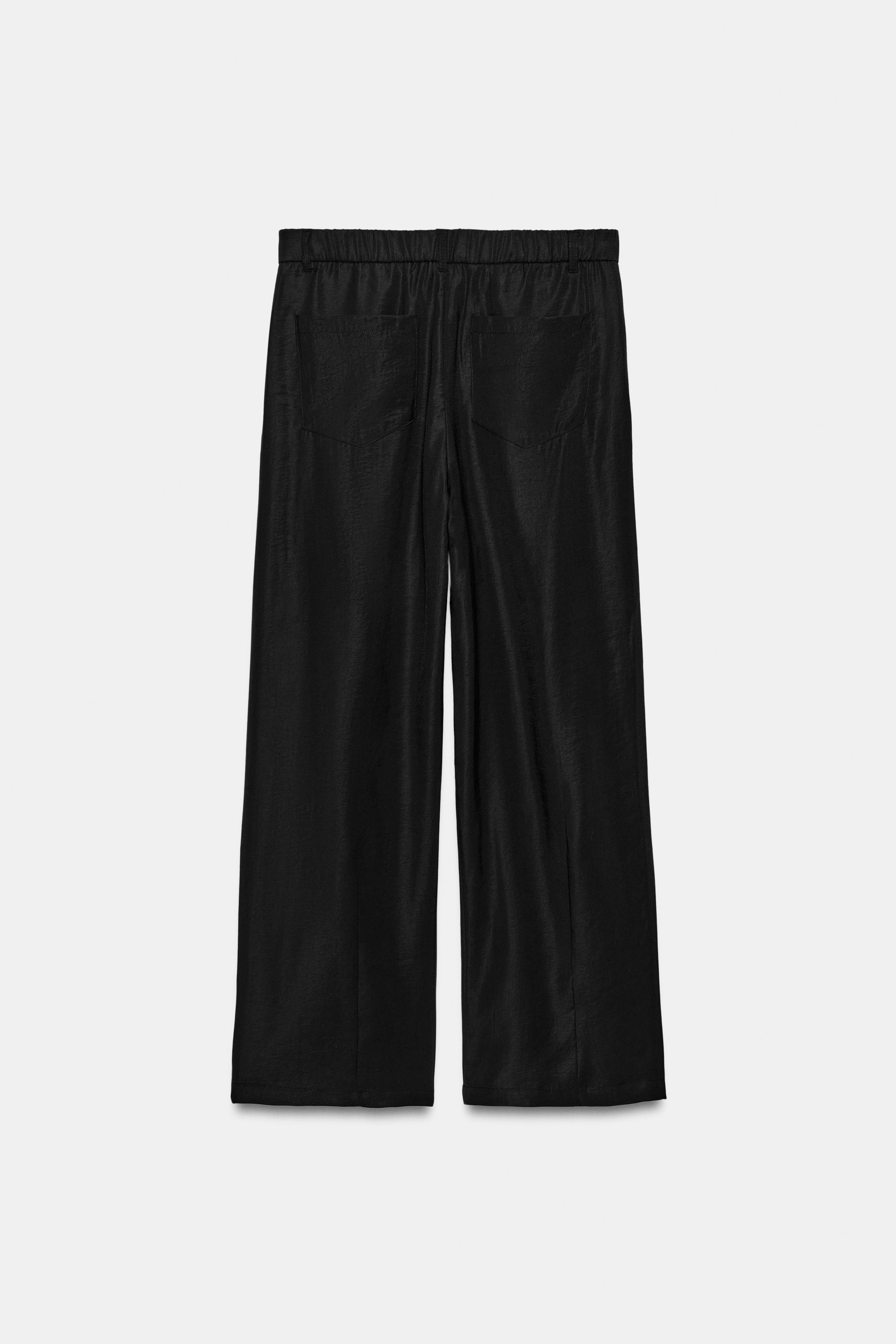 FLOWY PLEATED PANTS