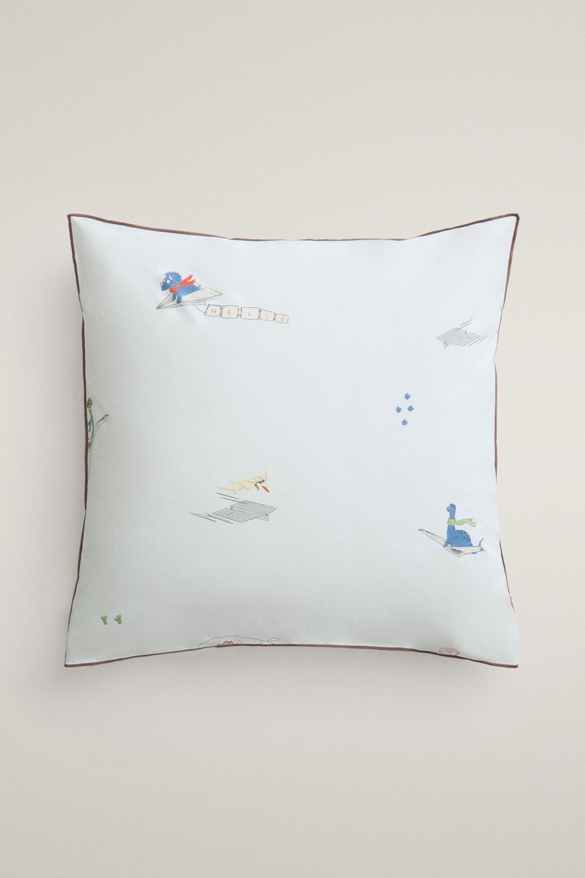 KIDS’ DINOSAUR PILLOWCASE — Light blue