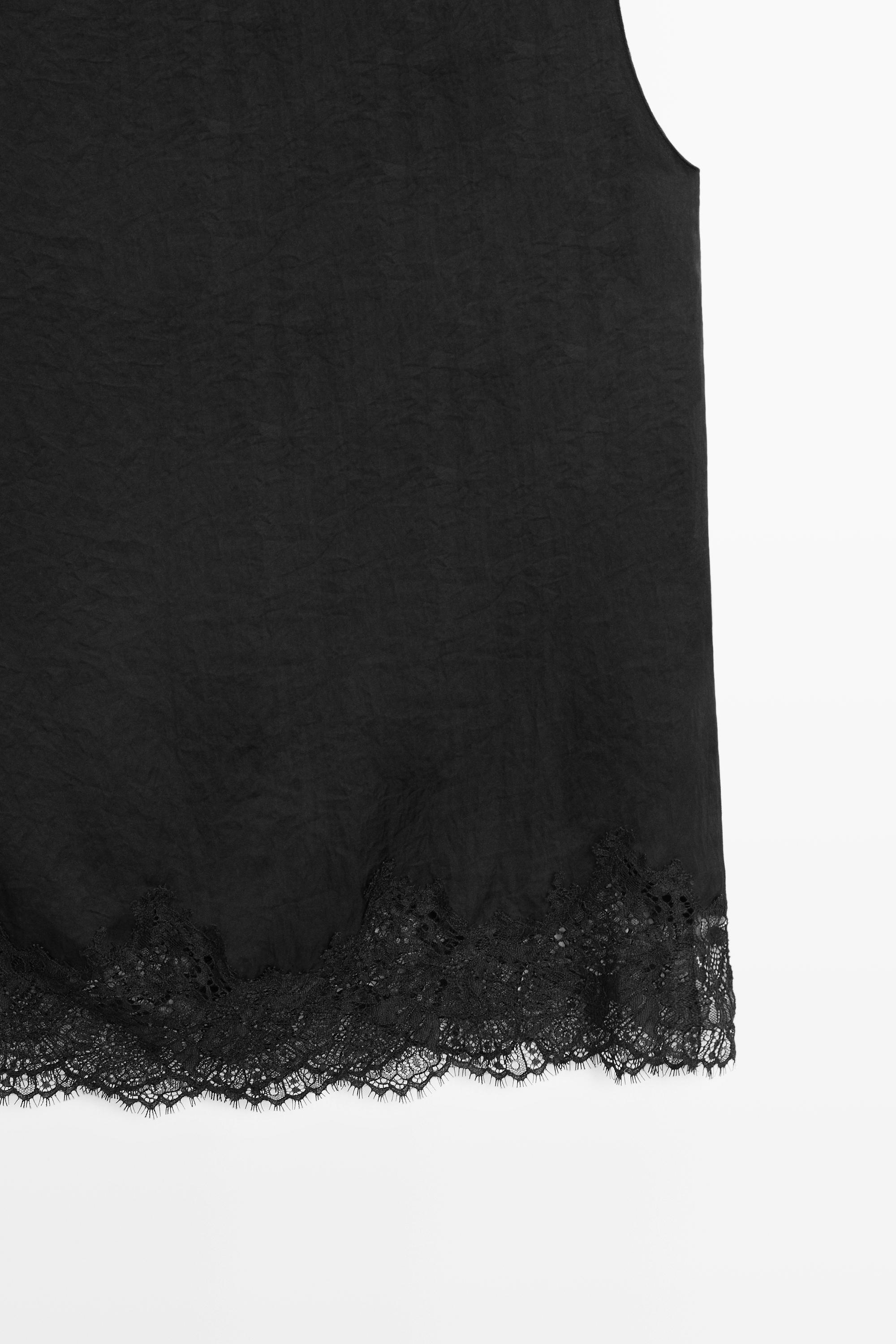 Flowing lace-detail top