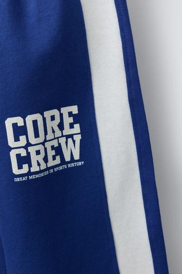 PANTALON À JAMBES LARGES ET BANDES SUR LES CÔTÉS - Bleu roi de Zara - Image 3