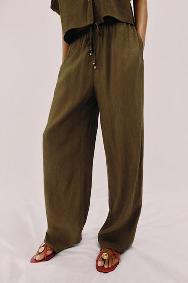 PANTALÓN FLUIDO RECTO - Oliva de Zara