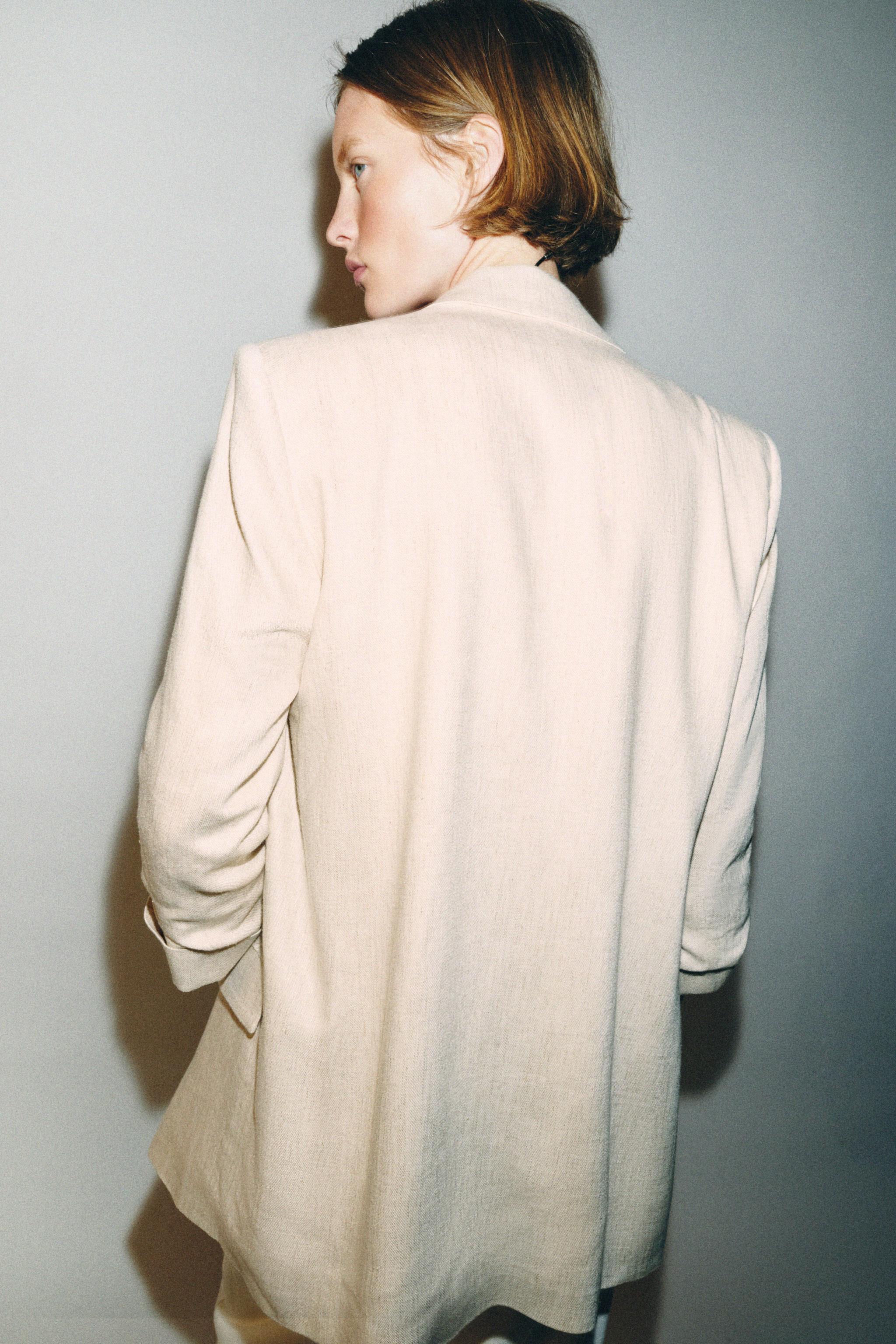 OPEN BLAZER WITH ROLLED-UP SLEEVES
