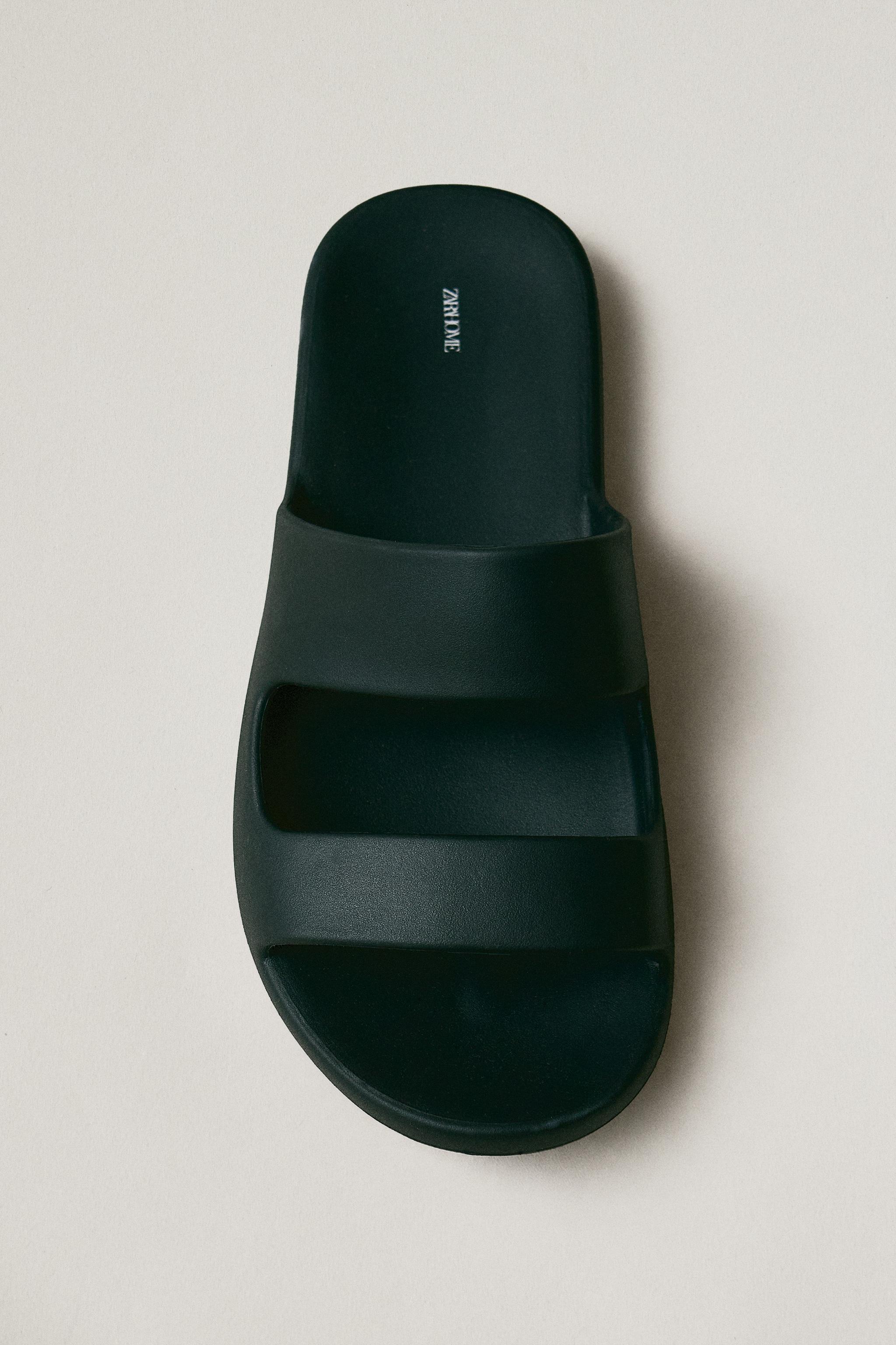 RUBBERISED FLAT SANDALS — Black