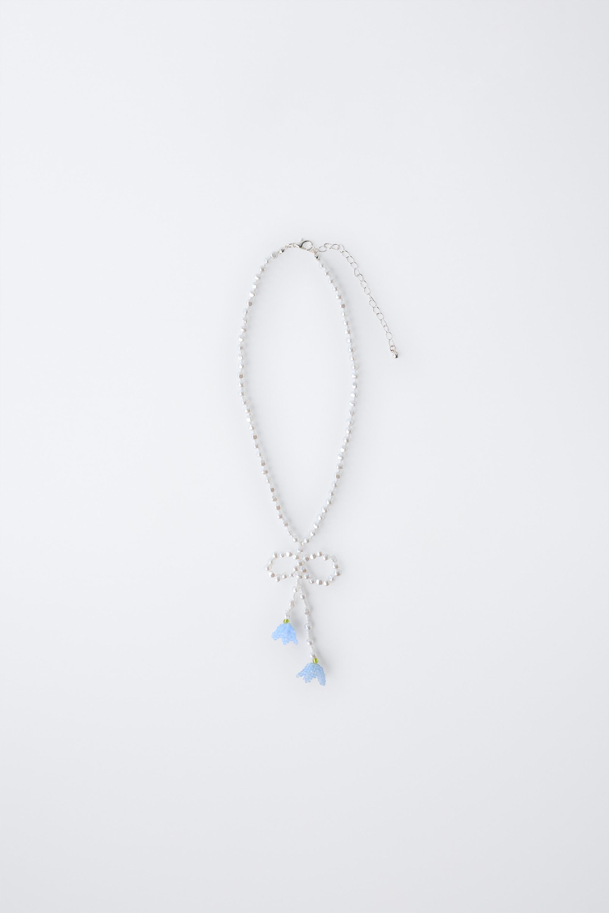 COLLIER PERLES FLEURS FANTAISIE