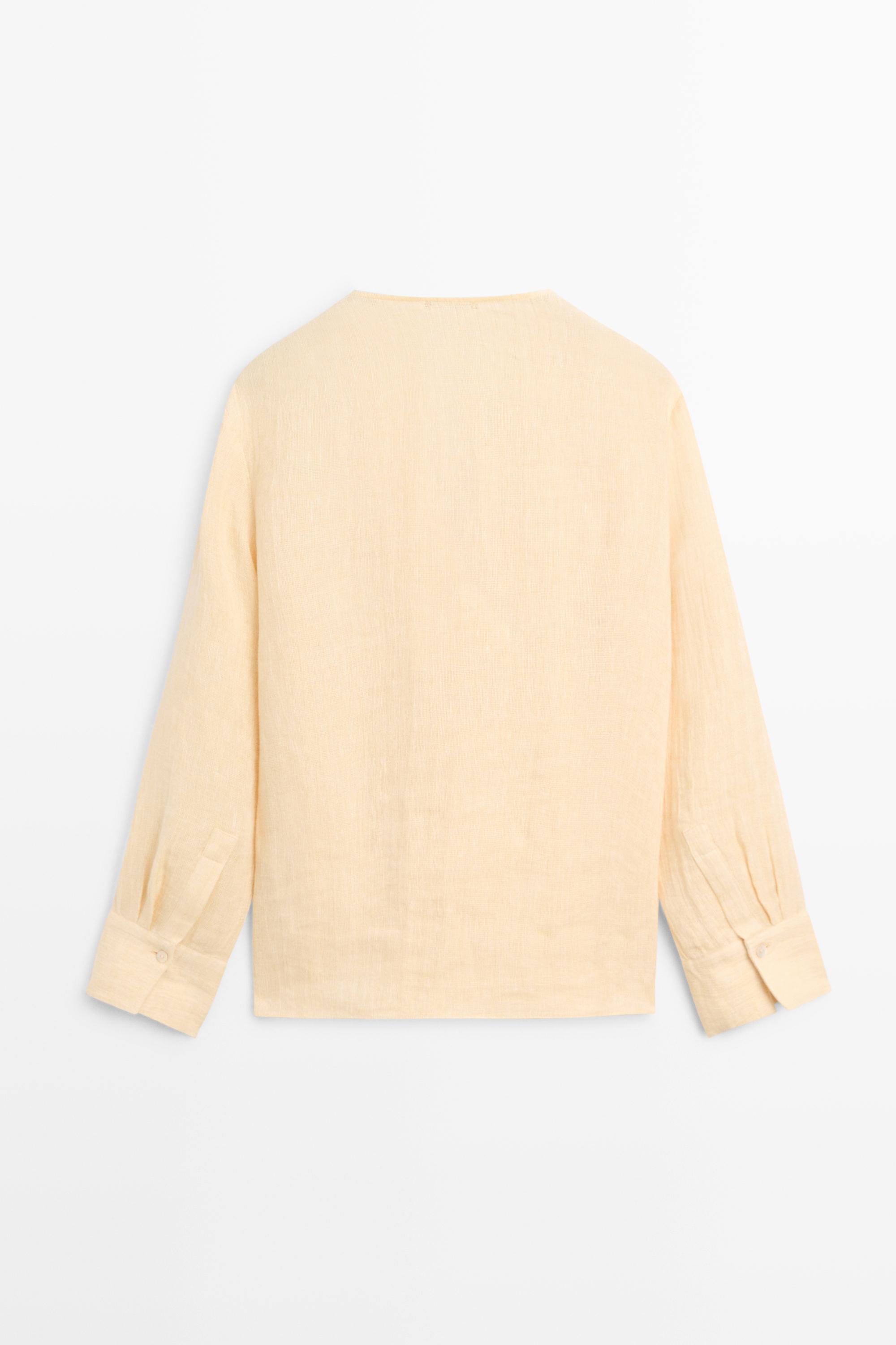 Flowing linen blouse with chest detail