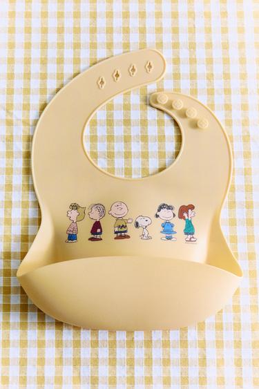BABERO INFANTIL SILICONA PEANUTS™ - Amarillo claro de Zara