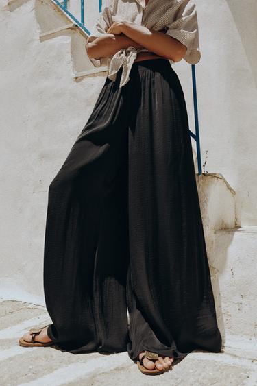 بنطلون منسدل عريض - أسود الخاص بـ Zara
