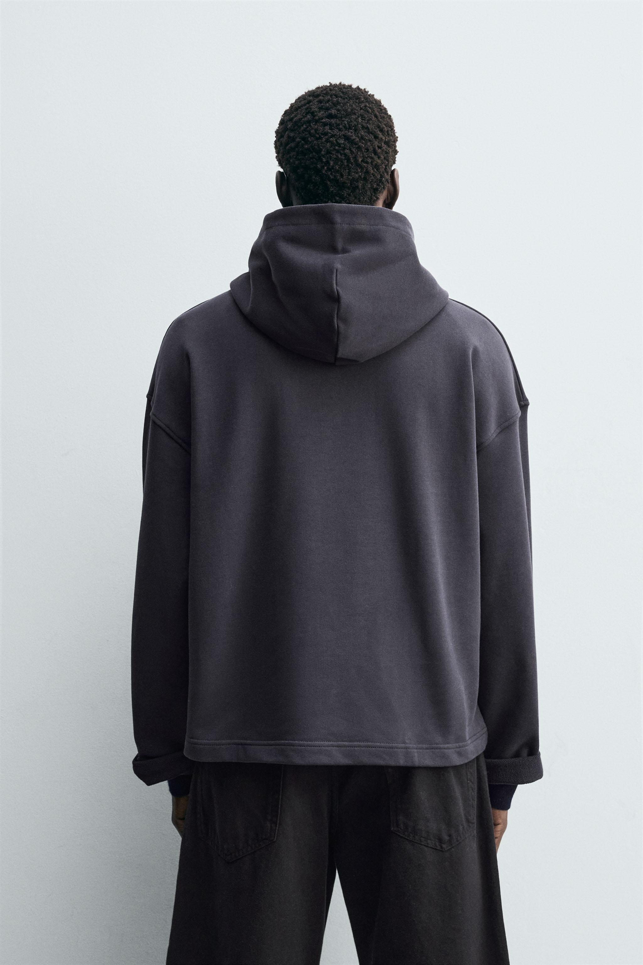 TEXTURED DRAWSTRING SWEATSHIRT