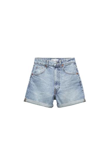 Light blue denim shorts with rolled hem and five pockets, on white background. Visible label on the waist.