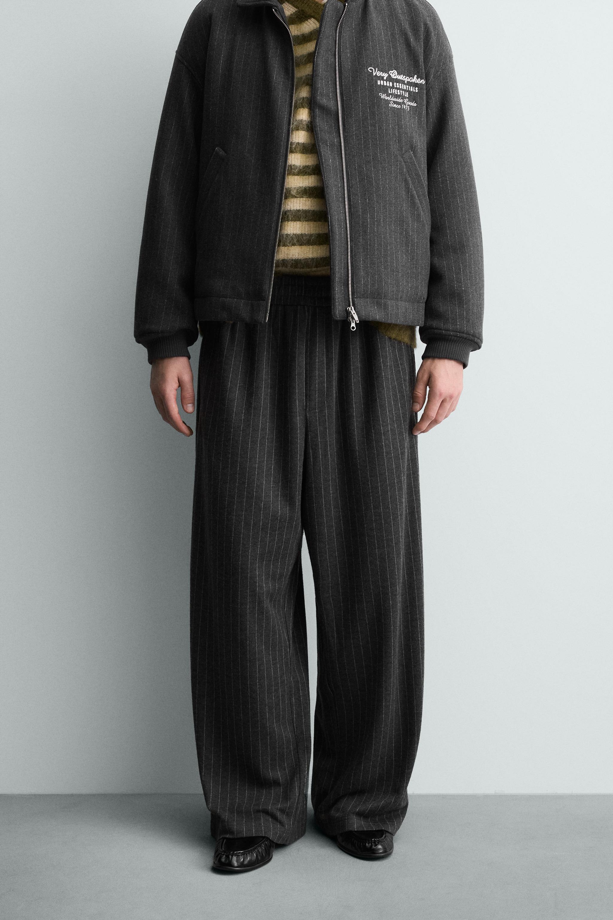 STRIPED BAGGY FIT PANTS