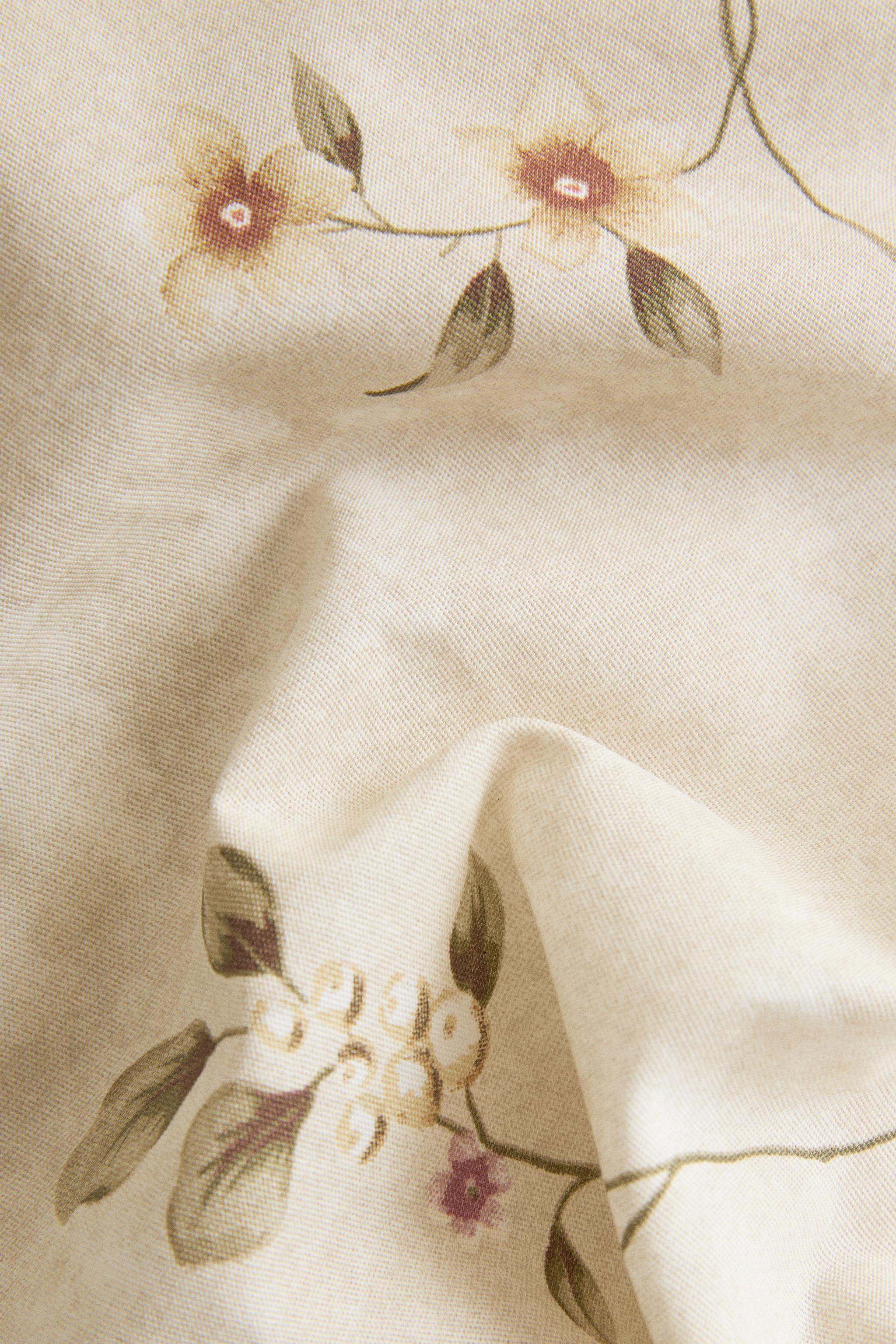 LOT DE 2 SERVIETTES IMPRIMÉ FLORAL ET DENTELLE