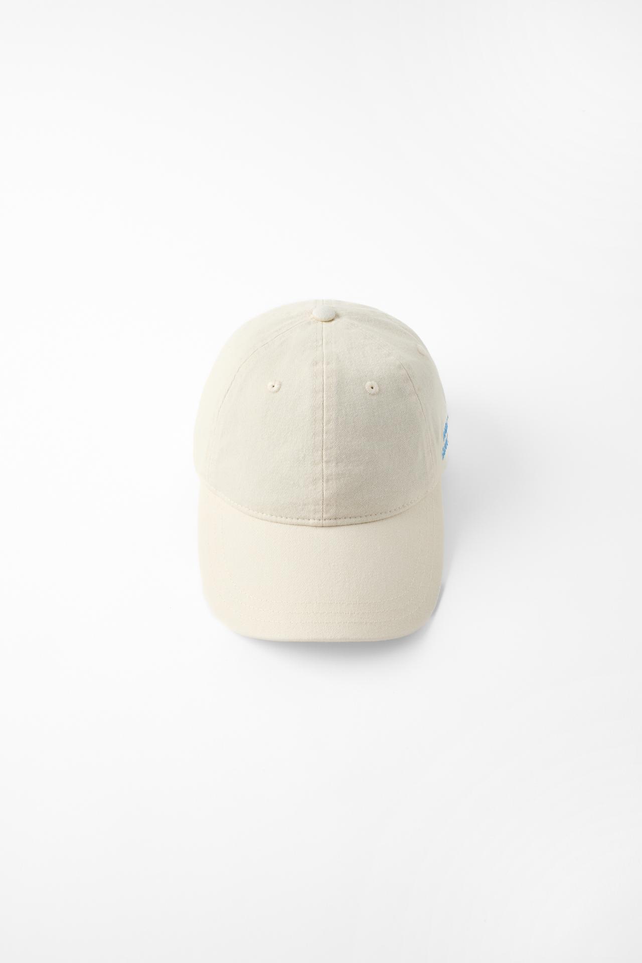 EMBROIDERED TEXT TWILL CAP — Ecru