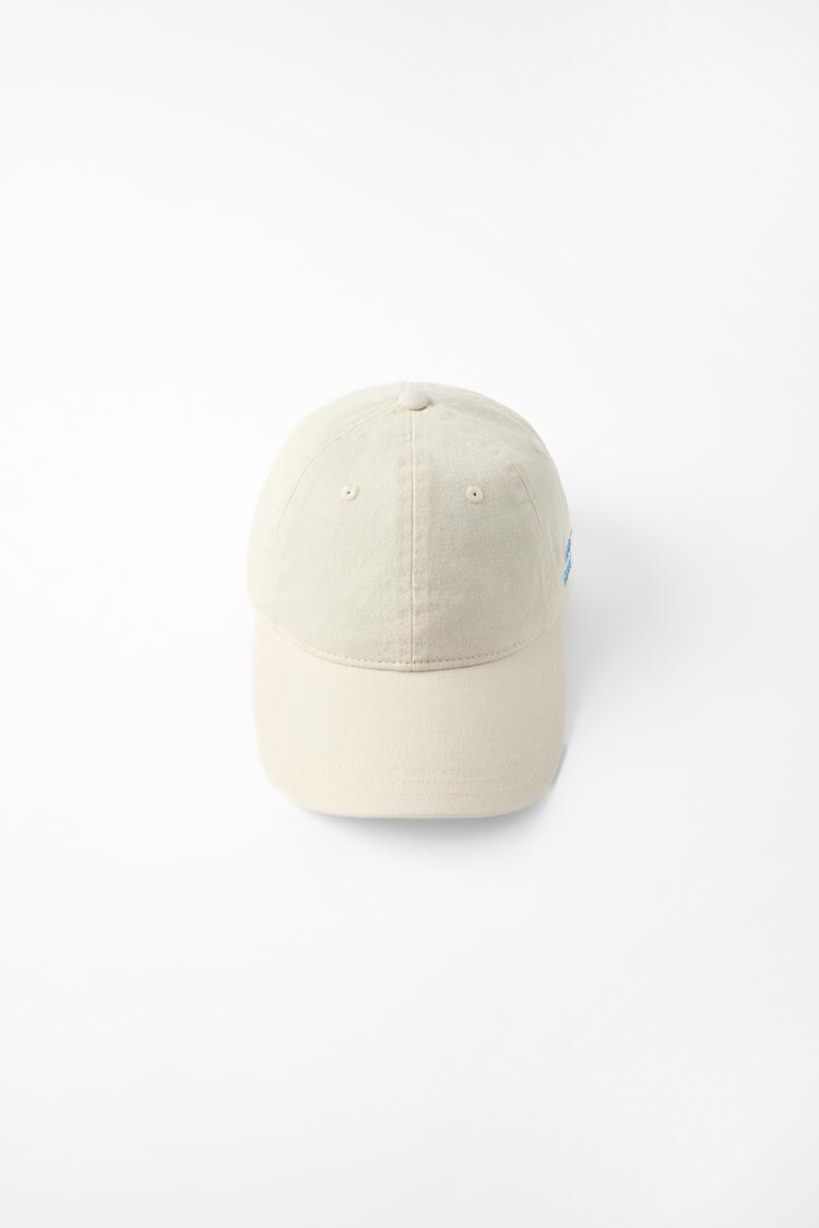 GORRA SARGA TEXTO BORDADO