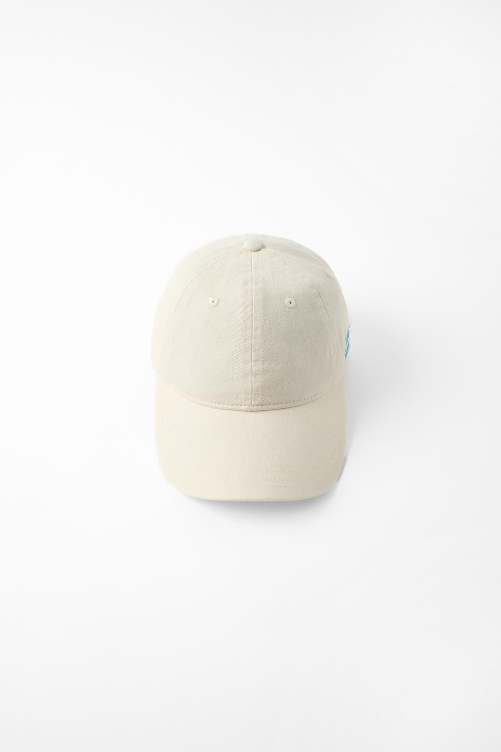 TWILL CAP WITH EMBROIDERED SLOGAN