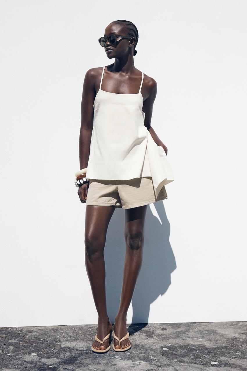 ASYMMETRIC PEPLUM TOP