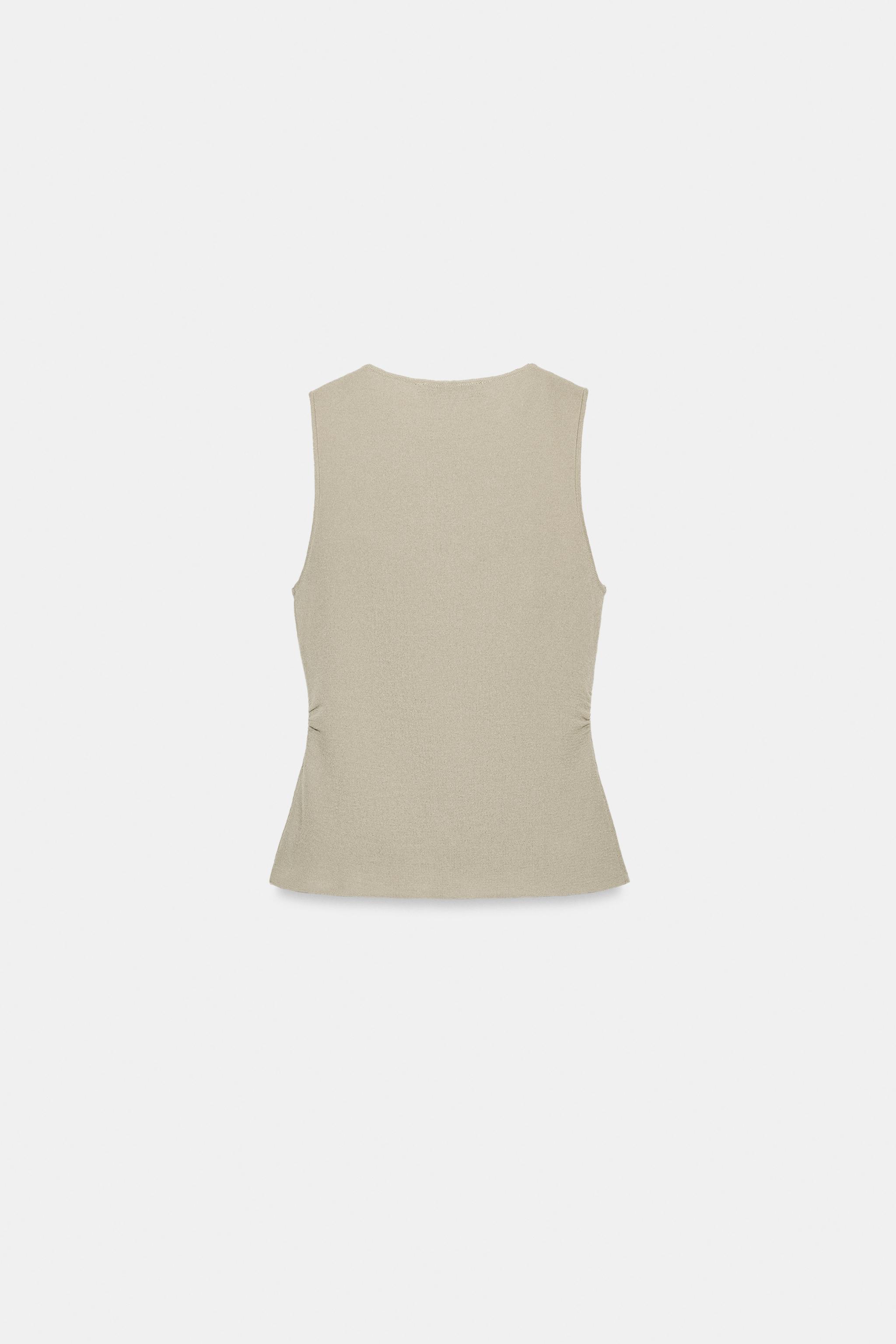 TOP DRAPÉ EN MAILLE