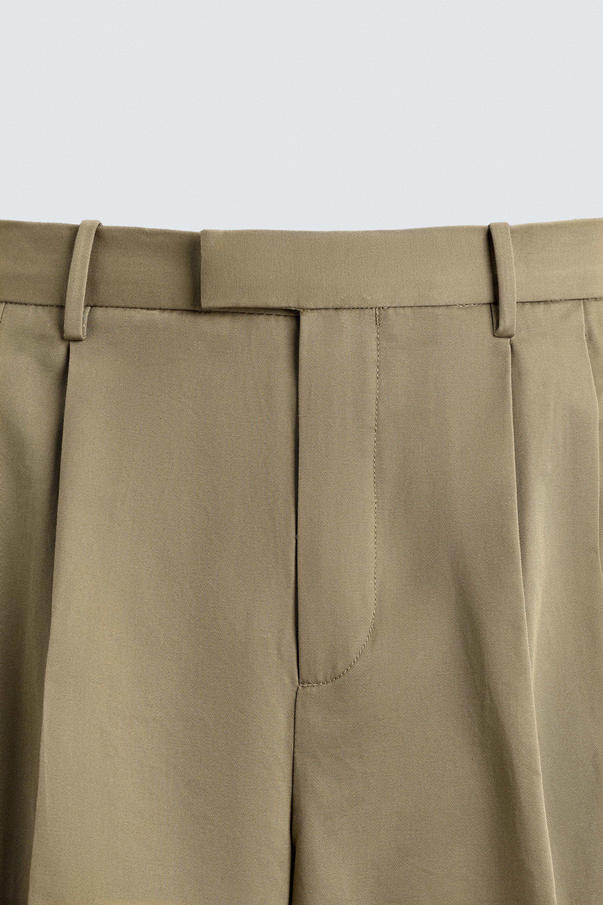 PLEATED WIDE FIT PANTS