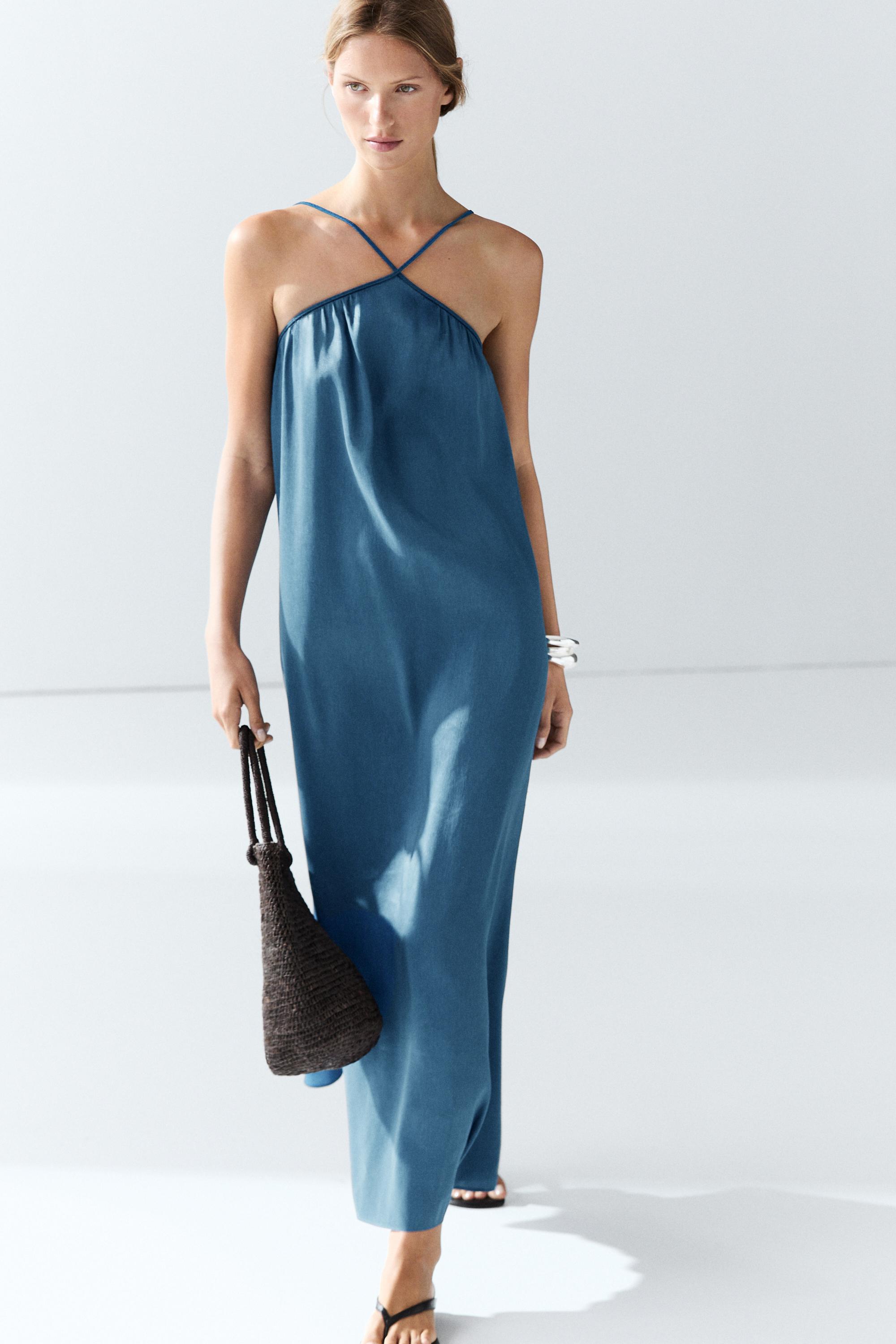 Long flowing dress with criss-cross straps — Blue