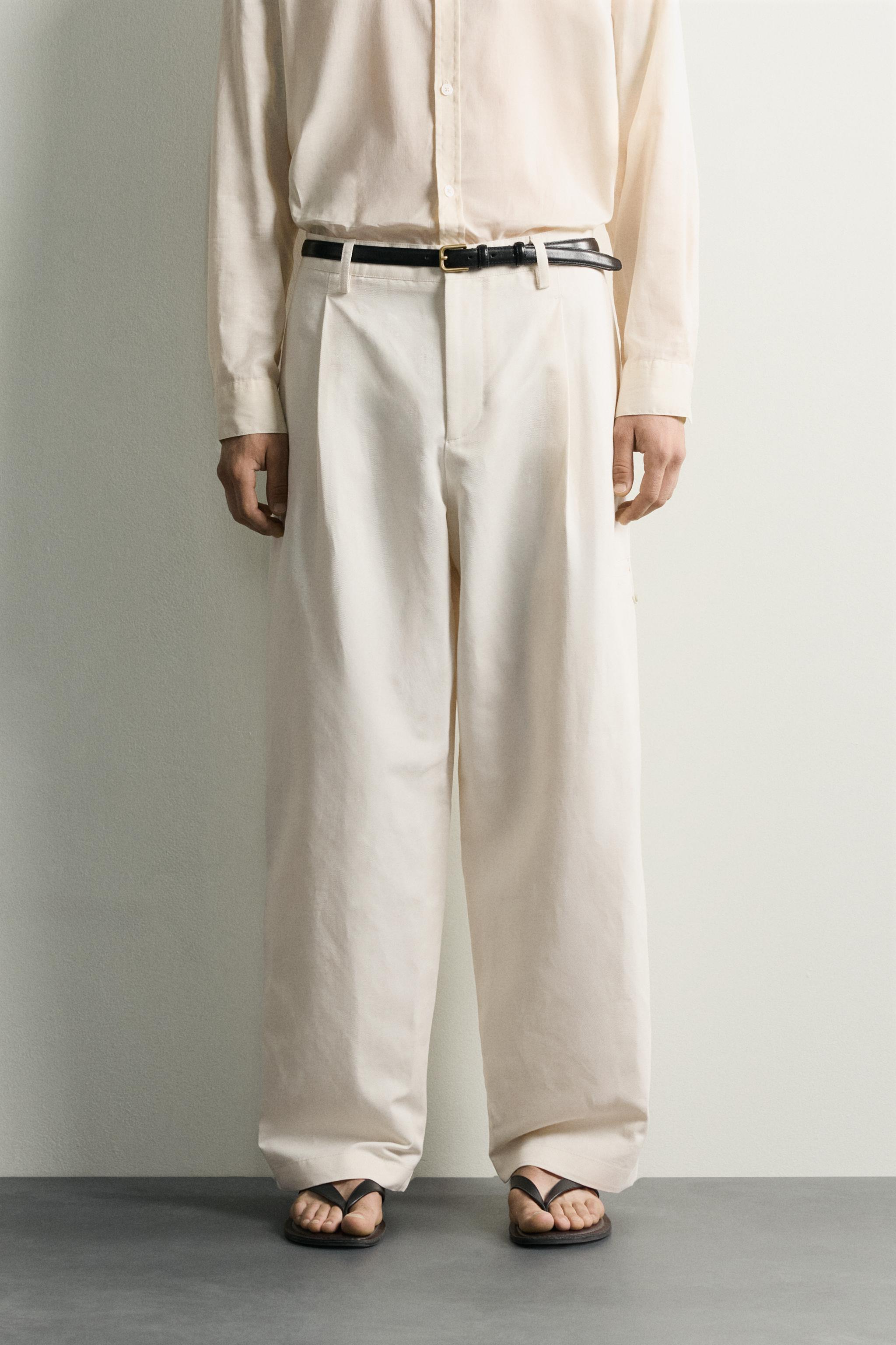 RELAXED FIT PLEATED PANTS — Ecru