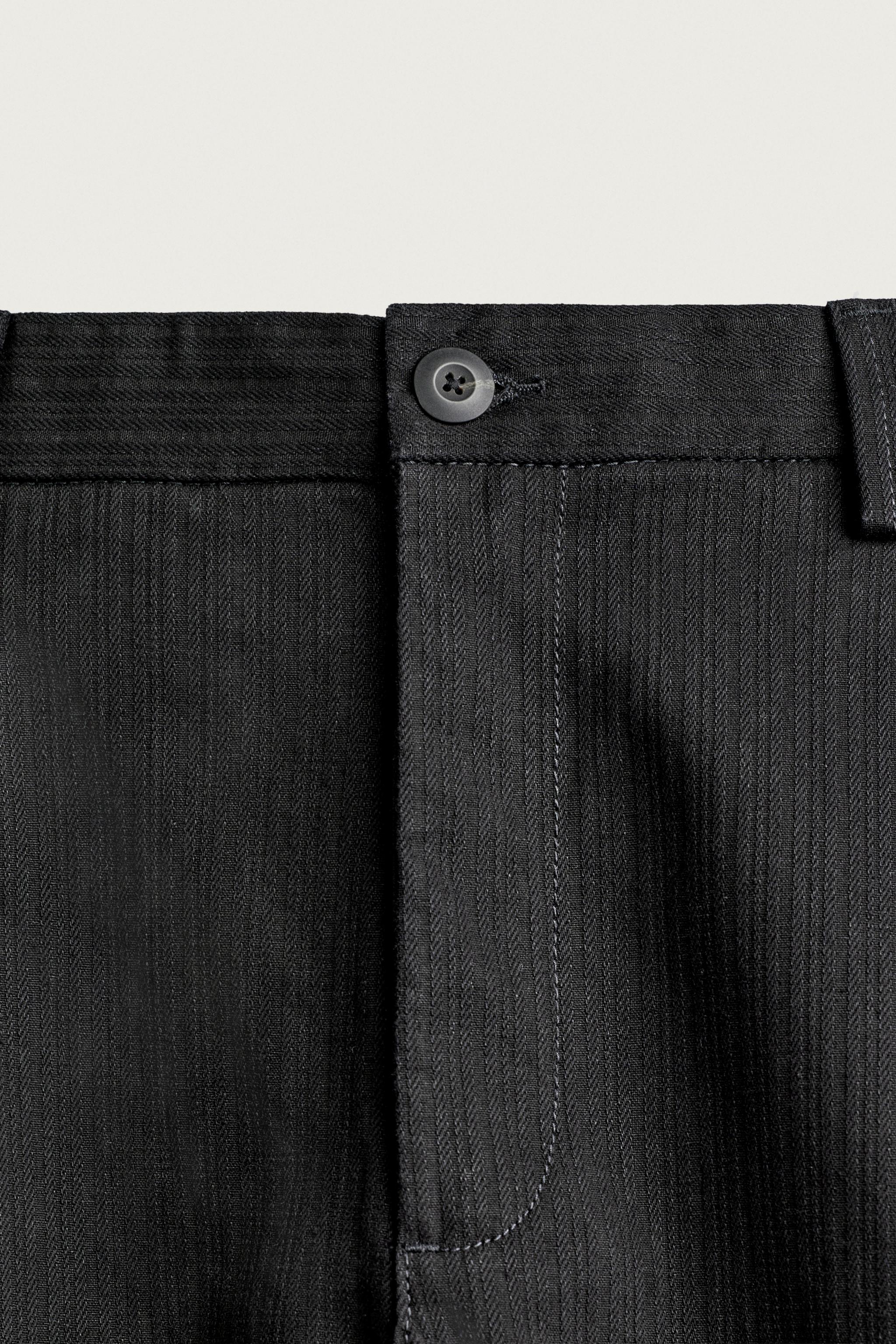 RELAXED FIT PLEATED CHINO PANTS