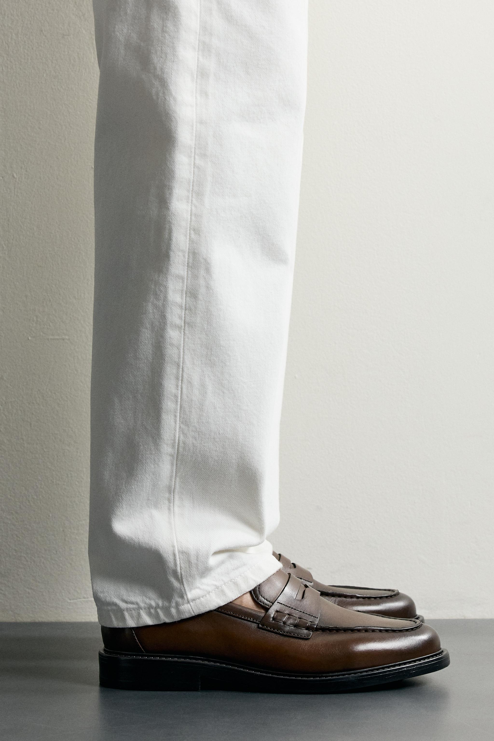 MOCASSINS EN CUIR AVEC MASQUE