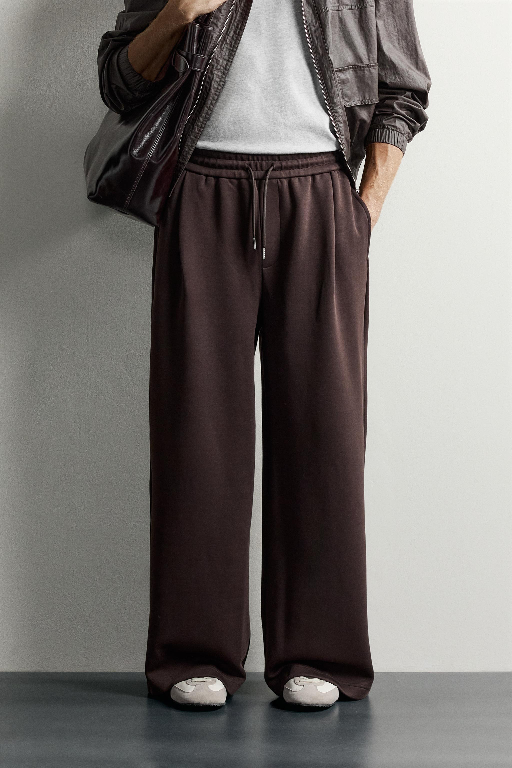 PLEATED BALLOON-FIT PANTS