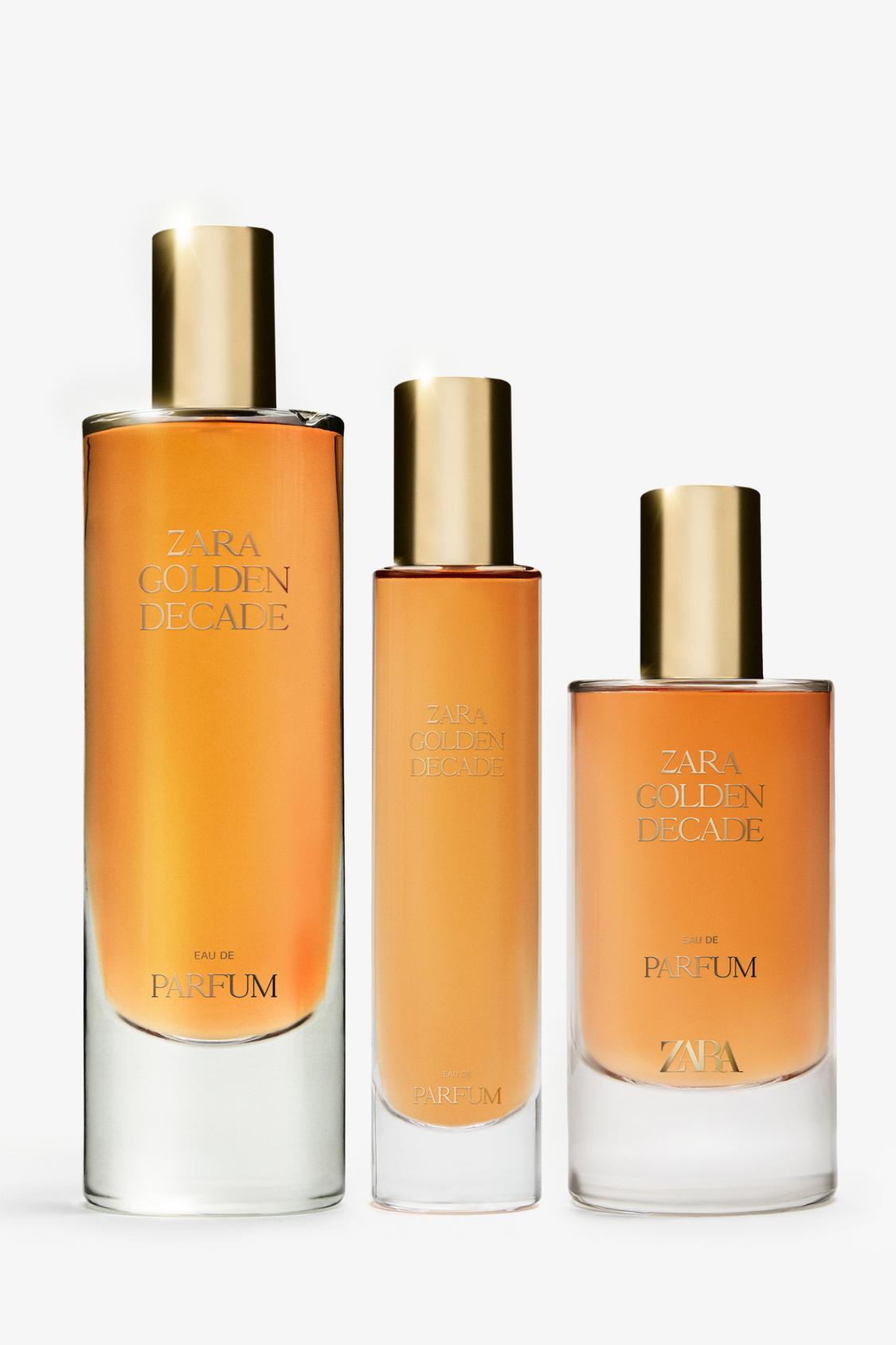 Tri stekleničke parfuma Zara Golden Decade z zlatimi pokrovčki.