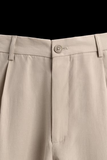 PANTALÓN FLUIDO PLIEGUES - Beige claro de Zara