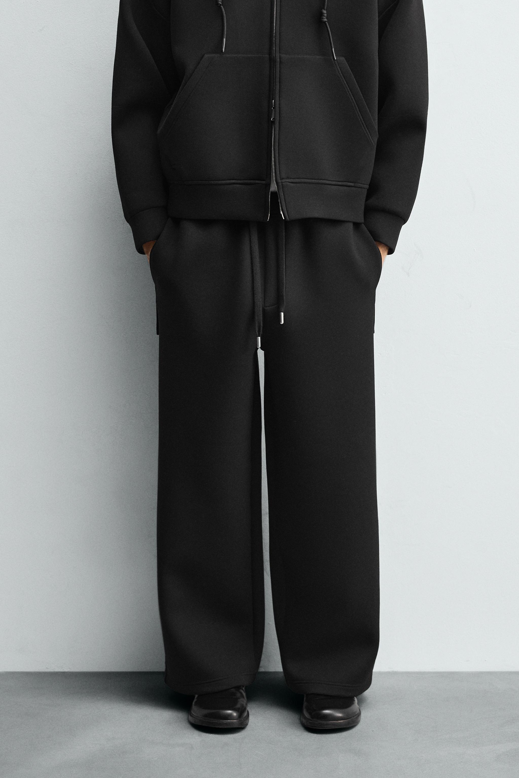 TECHNICAL WIDE-LEG JOGGING TROUSERS — Black