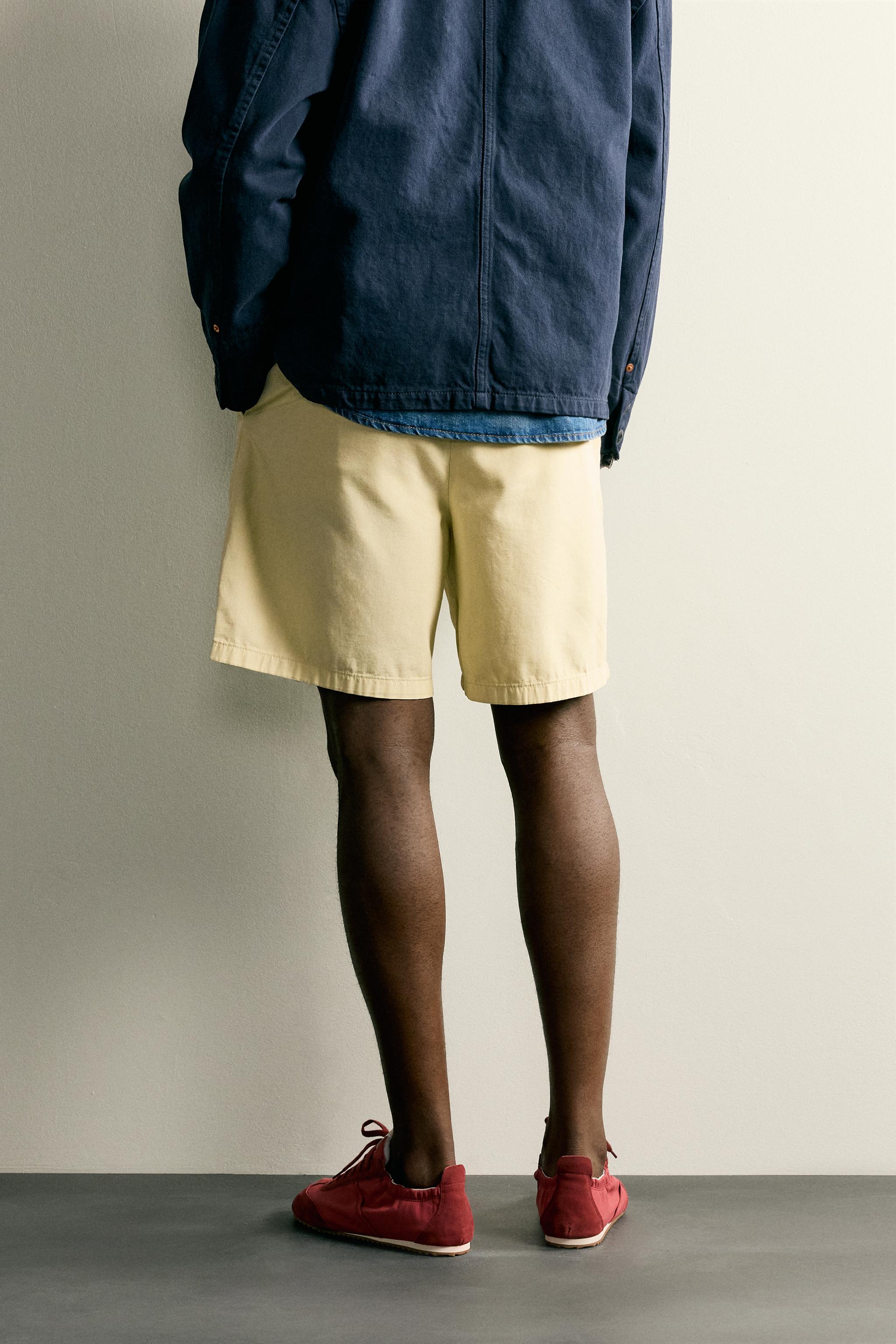 REGULAR FIT PLEATED BERMUDA SHORTS