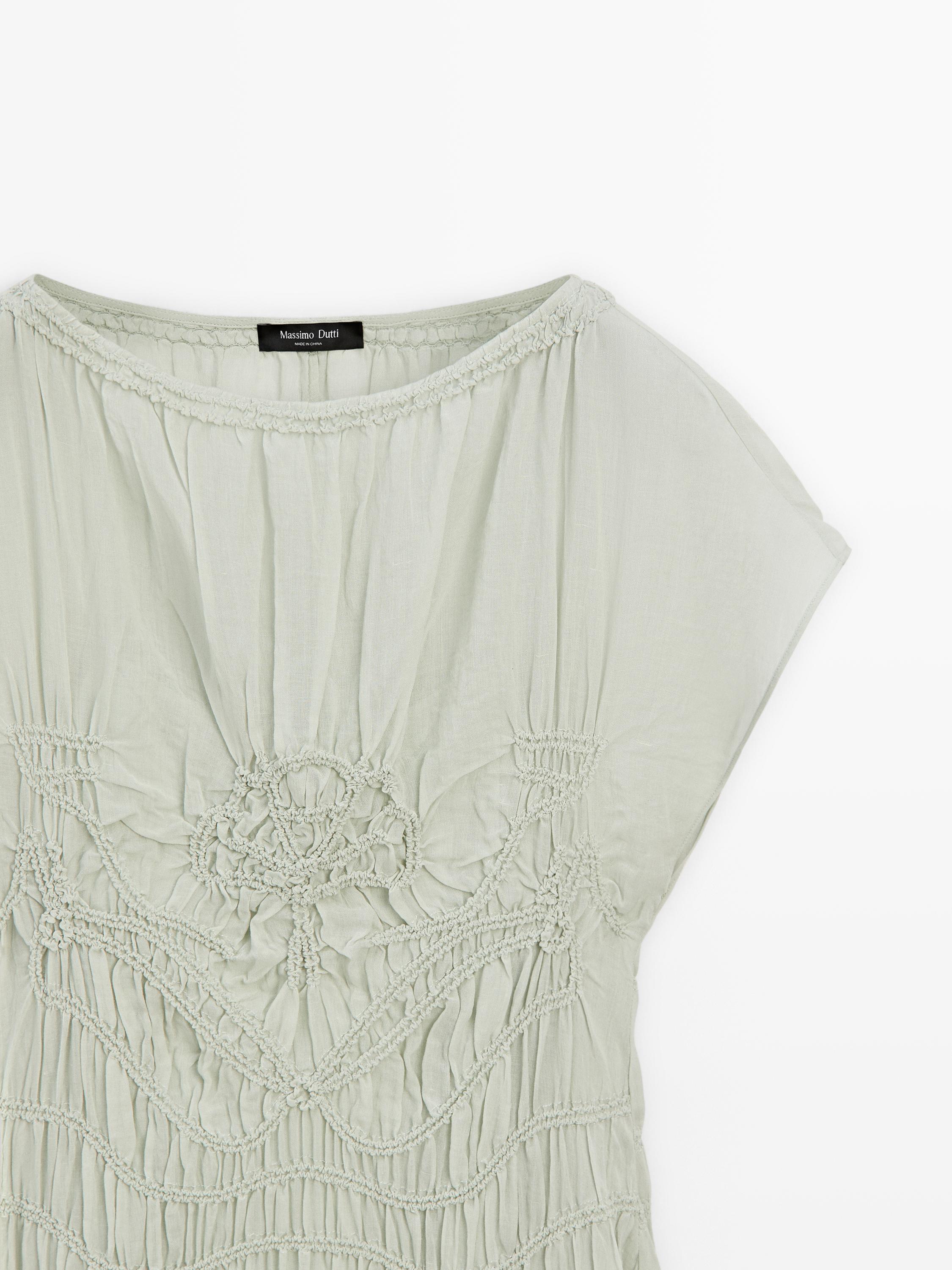 Long flowing dress with embroidered details