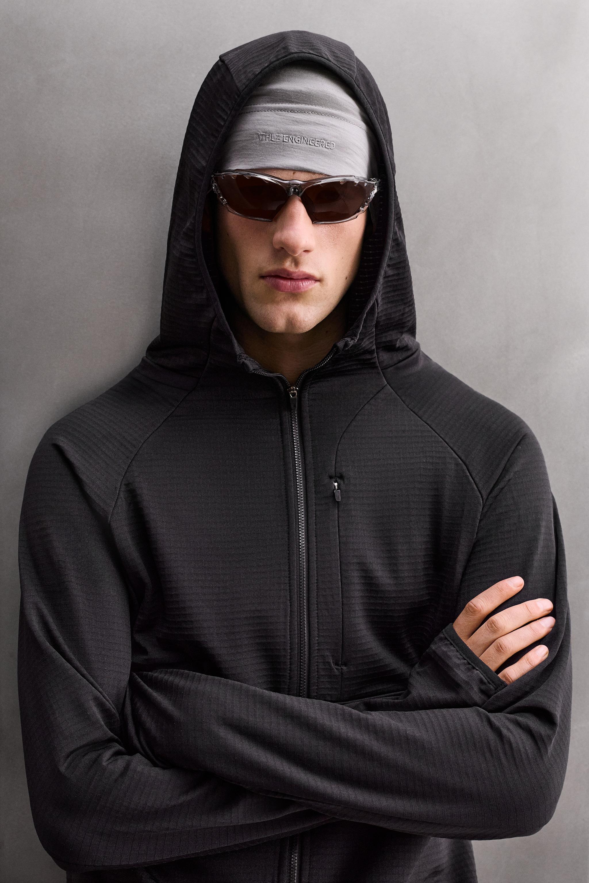 SWEAT TECHNIQUE À CAPUCHE BIMATIÈRE POLAIRE