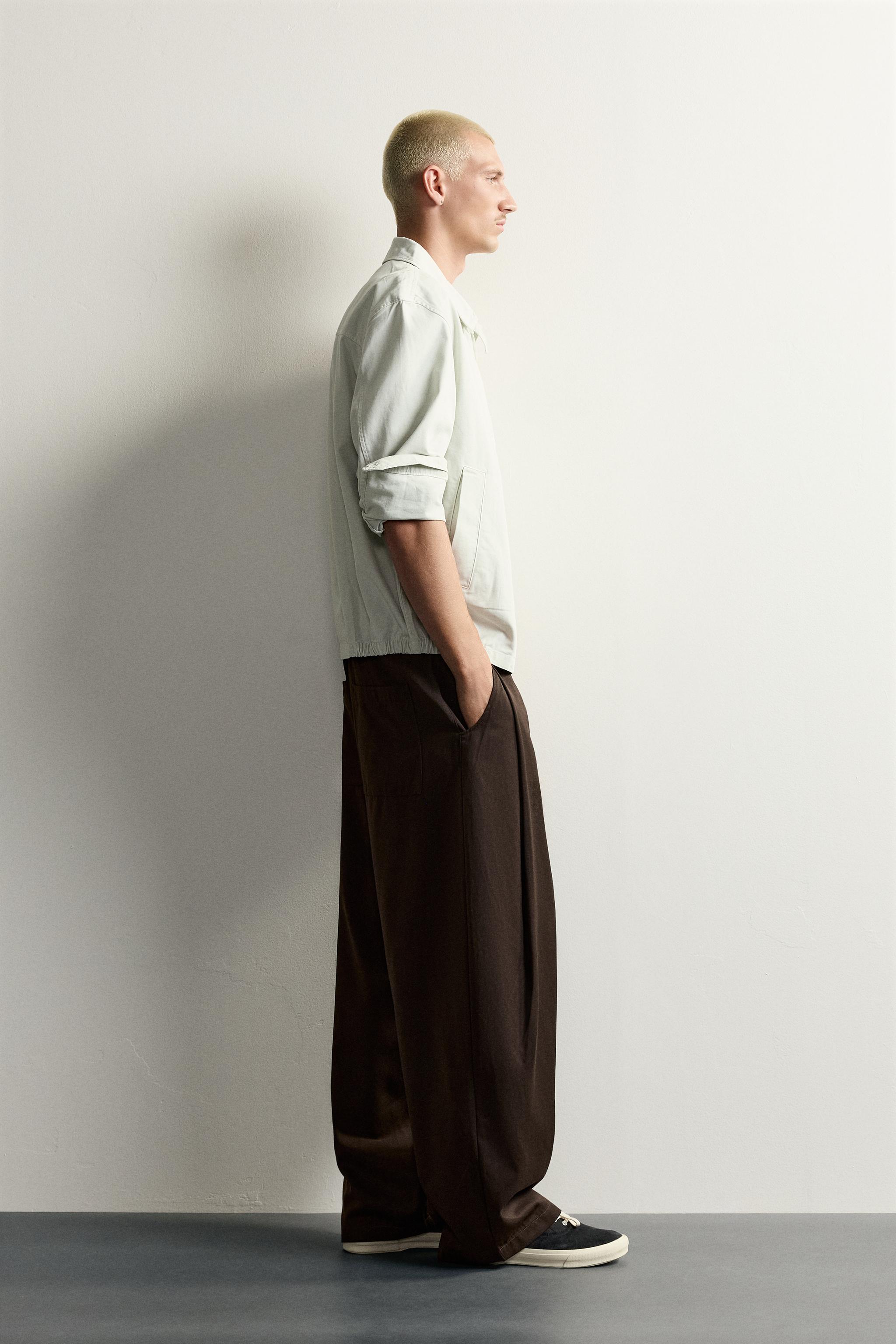 SIDE-PLEAT BALLOON FIT TROUSERS