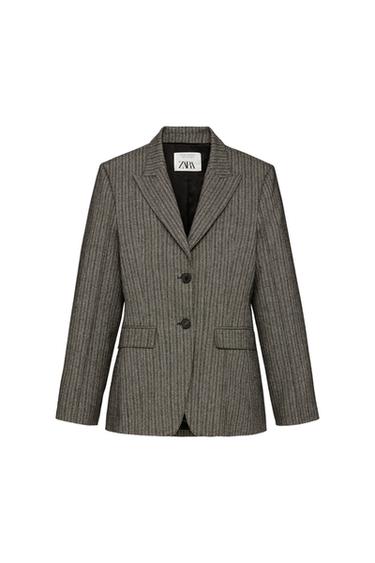 Front view of a grey jacket with vertical stripes, lapels, two buttons, and flap pockets.
